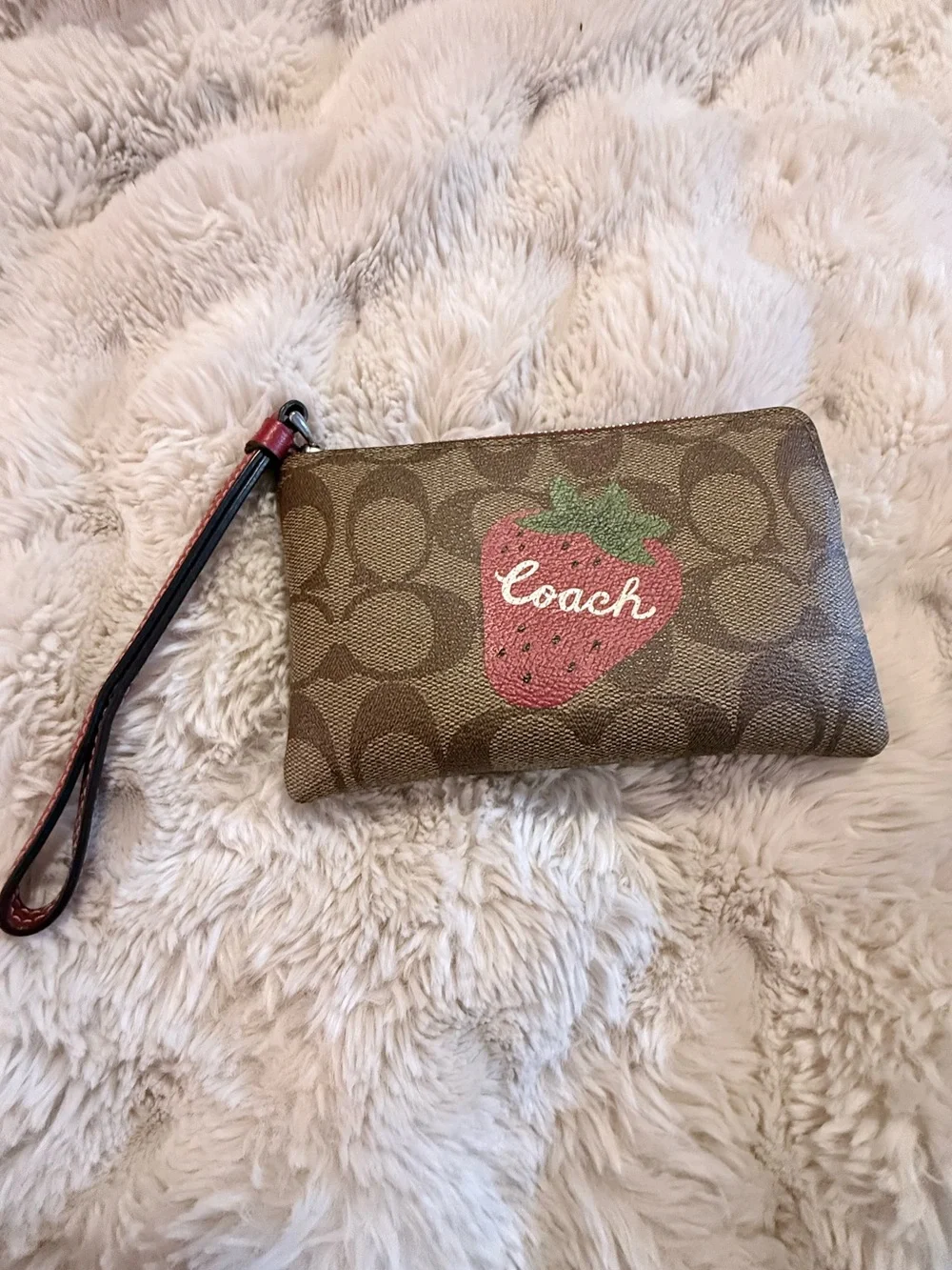 Coach Brown Signature Wristlet with Red Strawberry Graphic